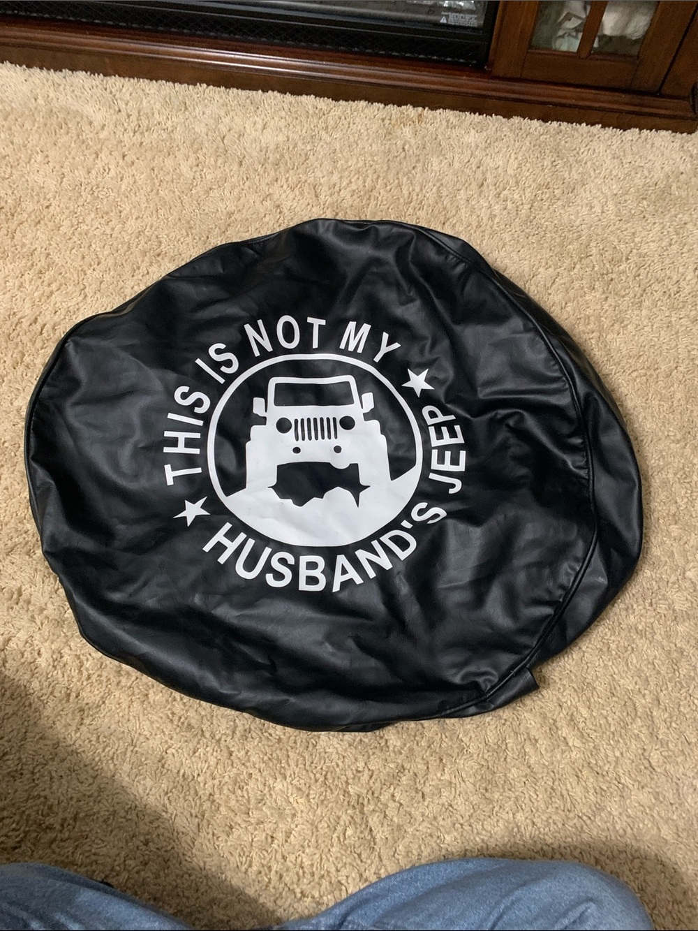 Jeep Black Spare Tire Cover with White Jeep Graphic and Slogan
